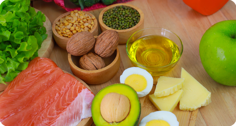 Collection of healthy foods on a wooden table